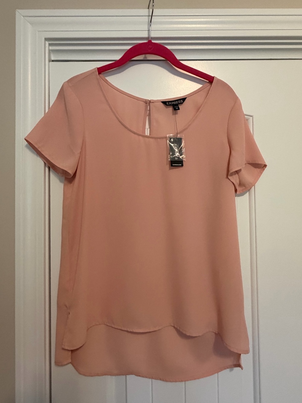New Express size XS women high low  scoop neck blouse top pink nude